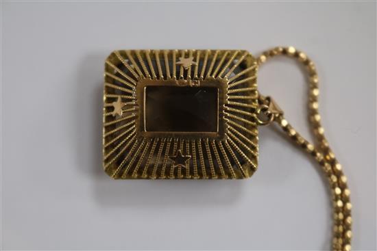 A continental yellow metal mounted smoky quartz pendant, on an 18ct gold chain, pendant 29mm.
